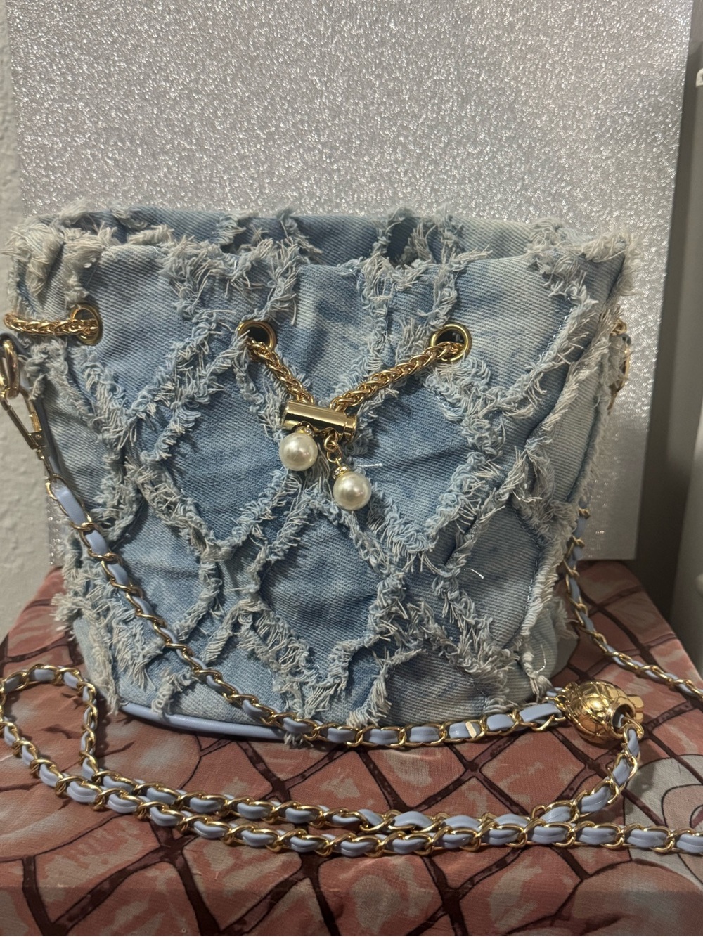 Frayed Denim Bucket Bag with Gold Chain and Pearl Accents - Light Blue
